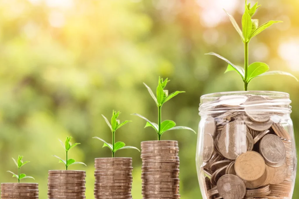 Jar filled with money and coins, featuring a green plant growing from the top, symbolizing sustainable financial growth